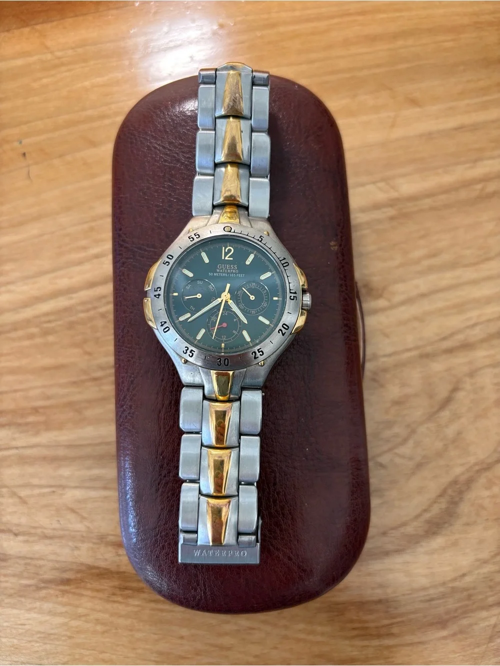 GUESS Two-Tone Men's Stainless Steel Watch in Silver and Gold with Green Dial